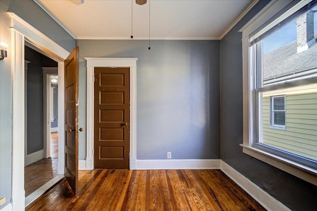 5 Gray Sts, Poughkeepsie, NY 12601 - empty room featuring crown molding, dark wood finished floors, and baseboards