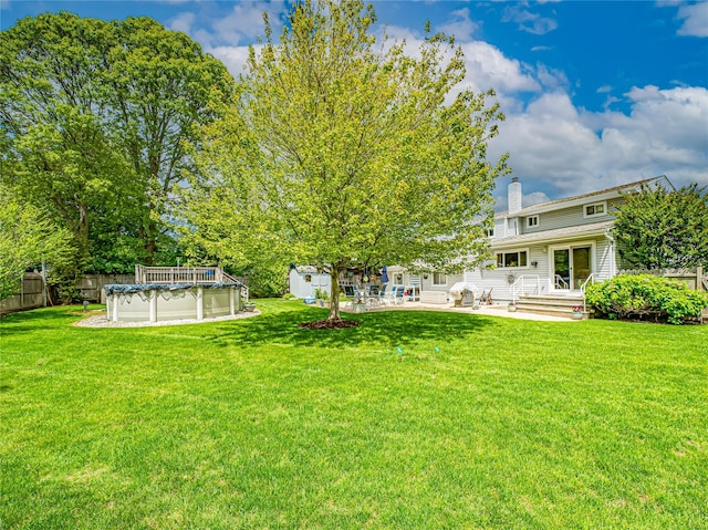 964 Manor Ln, Bay Shore, NY 11706 - view of yard with a patio area and a covered pool
