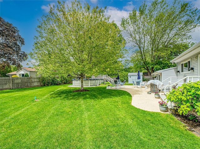 964 Manor Ln, Bay Shore, NY 11706 - view of yard featuring a patio area and an outdoor structure