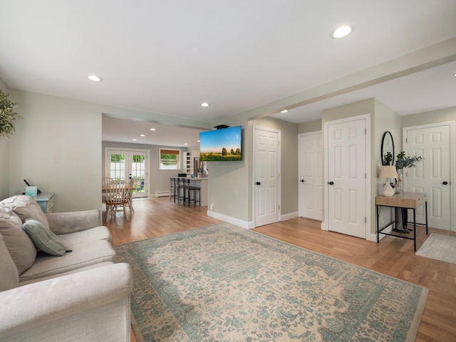 29 Chestnut St, Pearl River, NY 10965 - living room with wood finished floors, recessed lighting, and baseboards