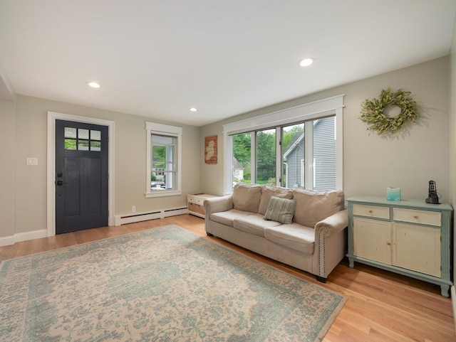 29 Chestnut St, Pearl River, NY 10965 - living room with a baseboard radiator, light wood-style floors, recessed lighting, and baseboards