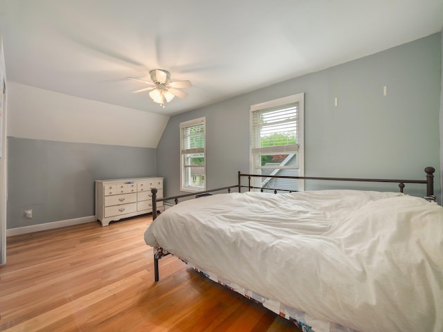 29 Chestnut St, Pearl River, NY 10965 - bedroom with light wood-type flooring, baseboards, vaulted ceiling, and ceiling fan