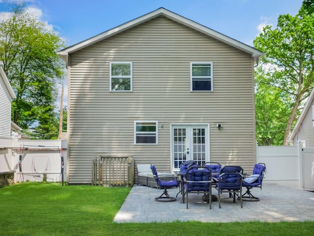 29 Chestnut St, Pearl River, NY 10965 - back of property with french doors and a patio area