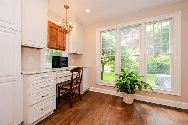 70 Loines Ave, Merrick, NY 11566 - office featuring built in desk, baseboards, dark wood-type flooring, healthy amount of natural light, and recessed lighting