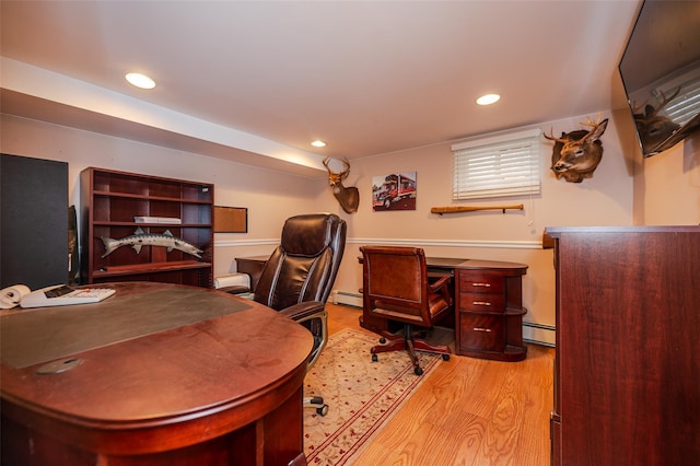 70 Loines Ave, Merrick, NY 11566 - office with light wood finished floors, a baseboard heating unit, and recessed lighting