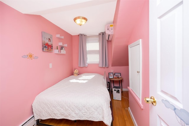 2226 124th St, College Point, NY 11356 - bedroom with light wood-type flooring, baseboard heating, and baseboards