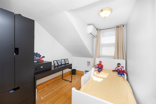 2226 124th St, College Point, NY 11356 - office area featuring an AC wall unit, light wood finished floors, and baseboards