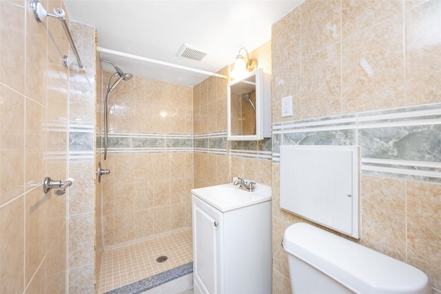 2226 124th St, College Point, NY 11356 - full bathroom with a tile shower, vanity, and toilet