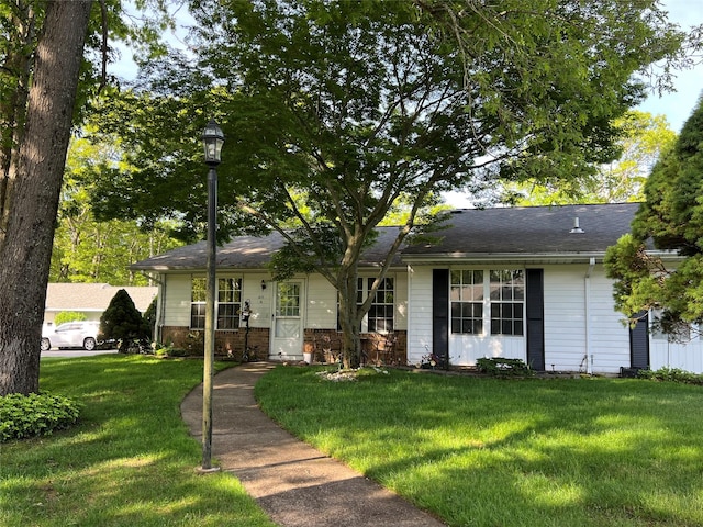 411A Weymouth Ct Unit 411A, Ridge, NY 11961 - ranch-style house featuring a front lawn