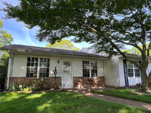 411A Weymouth Ct Unit 411A, Ridge, NY 11961 - view of front of property with a front lawn and brick siding