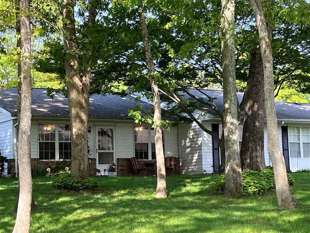411A Weymouth Ct Unit 411A, Ridge, NY 11961 - view of front of house featuring a front lawn