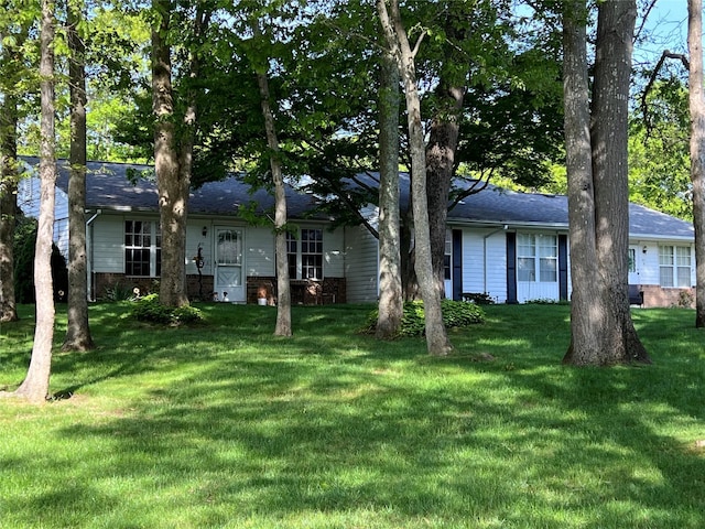 411A Weymouth Ct Unit 411A, Ridge, NY 11961 - single story home with a front lawn and brick siding