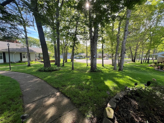 411A Weymouth Ct Unit 411A, Ridge, NY 11961 - surrounding community featuring a yard