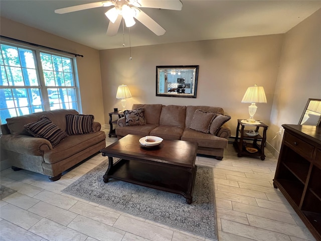 411A Weymouth Ct Unit 411A, Ridge, NY 11961 - living room with a ceiling fan, wood tiled floors, and baseboards