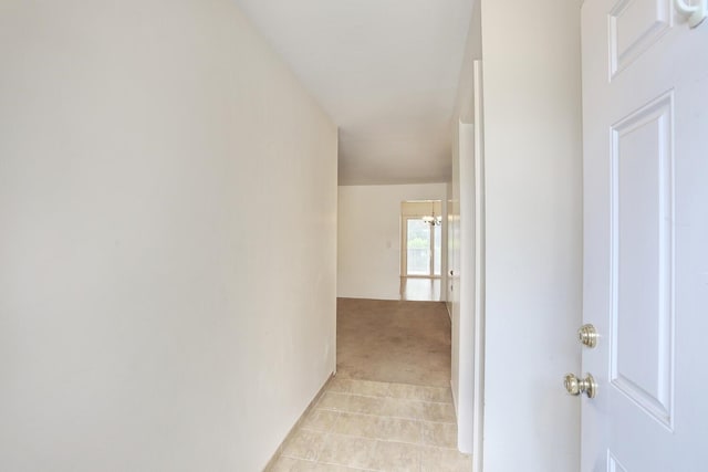 554 Kensico Ct, Suffern, NY 10901 - hallway with light colored carpet and light tile patterned flooring