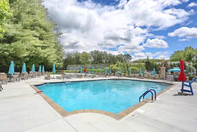 554 Kensico Ct, Suffern, NY 10901 - community pool with a patio and view of scattered trees