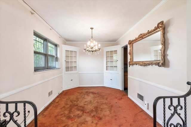 26-03 157th St, Flushing, NY 11354 - unfurnished dining area featuring a chandelier, carpet flooring, crown molding, and baseboards