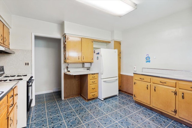 26-03 157th St, Flushing, NY 11354 - kitchen with range, freestanding refrigerator, under cabinet range hood, light countertops, and tasteful backsplash
