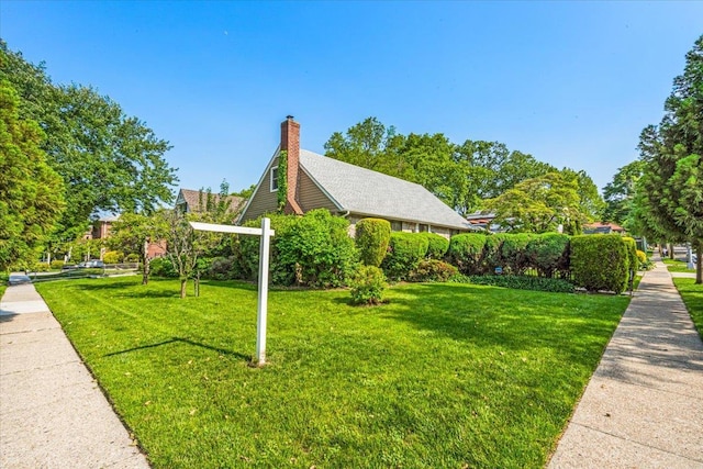26-03 157th St, Flushing, NY 11354 - view of home's community with a lawn
