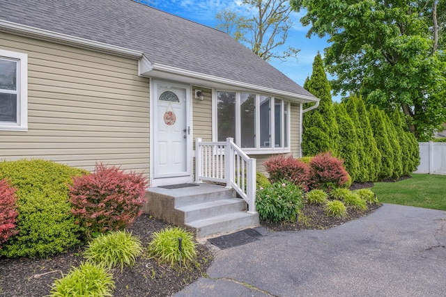 2251 Ocean Ave, Ronkonkoma, NY 11779 - entrance to property with roof with shingles
