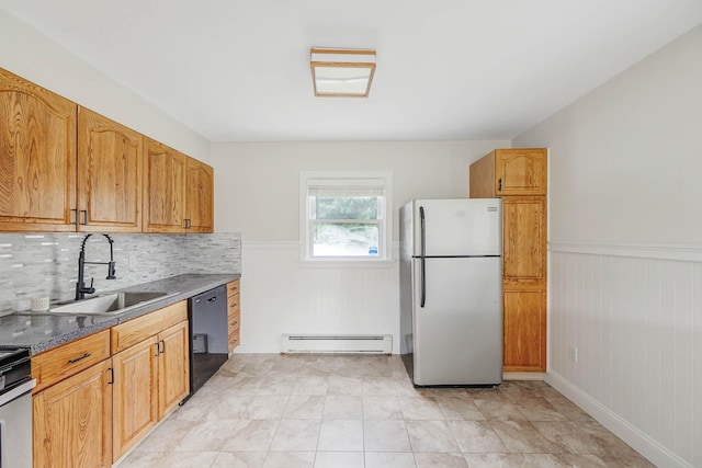 2251 Ocean Ave, Ronkonkoma, NY 11779 - kitchen with freestanding refrigerator, dishwasher, a baseboard radiator, a sink, and wainscoting