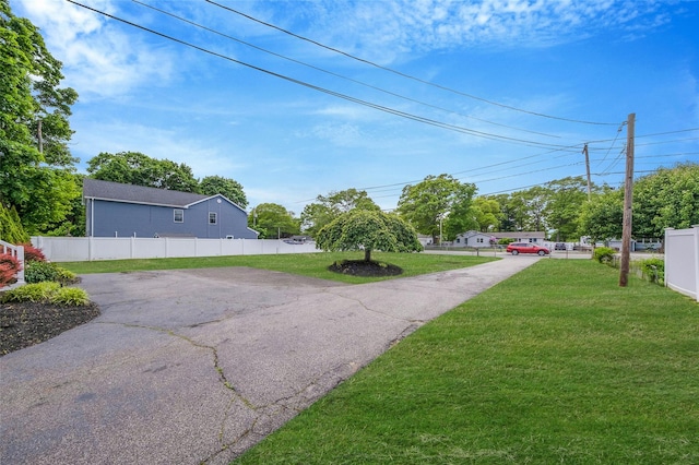 2251 Ocean Ave, Ronkonkoma, NY 11779 - view of yard featuring driveway