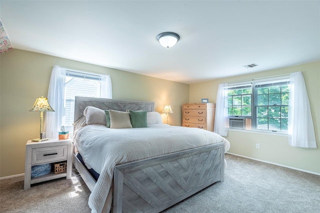 103 Woods Ave, Malverne, NY 11565 - carpeted bedroom with baseboards, lofted ceiling, and cooling unit