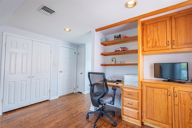 103 Woods Ave, Malverne, NY 11565 - home office featuring wood finished floors, built in study area, recessed lighting, and baseboards