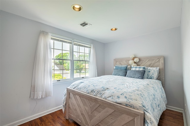 103 Woods Ave, Malverne, NY 11565 - bedroom featuring baseboards, dark wood-style flooring, and recessed lighting