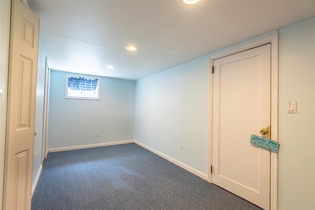 103 Woods Ave, Malverne, NY 11565 - spare room featuring dark carpet, baseboards, and recessed lighting
