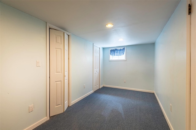 103 Woods Ave, Malverne, NY 11565 - basement featuring dark colored carpet, recessed lighting, and baseboards
