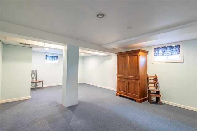 103 Woods Ave, Malverne, NY 11565 - below grade area featuring dark carpet, baseboards, and recessed lighting