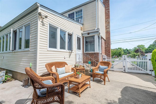 103 Woods Ave, Malverne, NY 11565 - view of patio / terrace with a gate and an outdoor hangout area