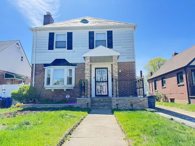 58-36 Bell Blvd, Bayside, NY 11364 - view of front facade featuring brick siding and a chimney