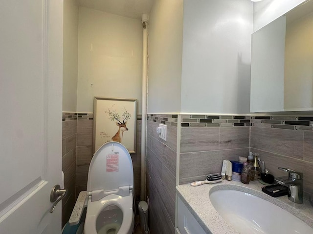 58-36 Bell Blvd, Bayside, NY 11364 - bathroom featuring vanity, toilet, and tile walls