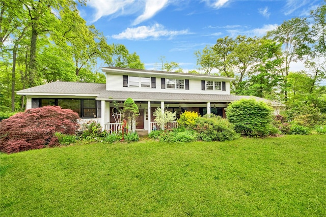 64 Lincoln Rd, Putnam Valley, NY 10579 - traditional-style home featuring covered porch, a front yard, and a shingled roof