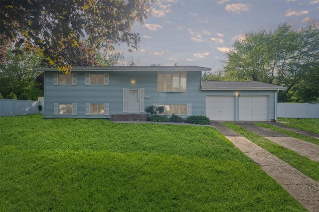 8 Ridge Rd, Wheatley Heights, NY 11798 - bi-level home featuring a garage and driveway