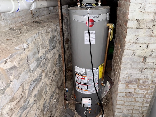 37 Liberty St, Newburgh, NY 12550 - utility room featuring water heater