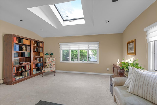 5 Seaview Ln, Port Washington, NY 11050 - sitting room featuring vaulted ceiling, a skylight, light carpet, and baseboards