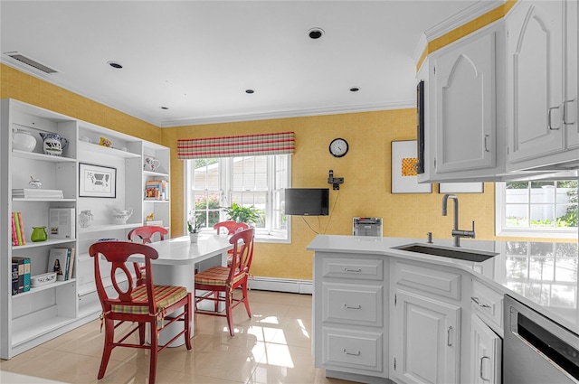 5 Seaview Ln, Port Washington, NY 11050 - kitchen featuring a sink, stainless steel dishwasher, baseboard heating, light tile patterned floors, and ornamental molding