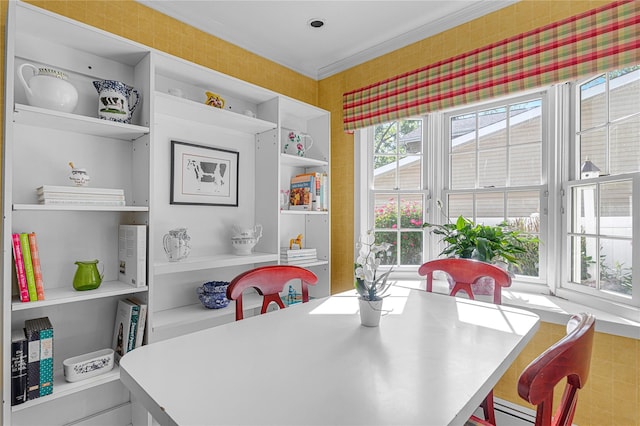 5 Seaview Ln, Port Washington, NY 11050 - dining space featuring crown molding, wallpapered walls, and a baseboard heating unit