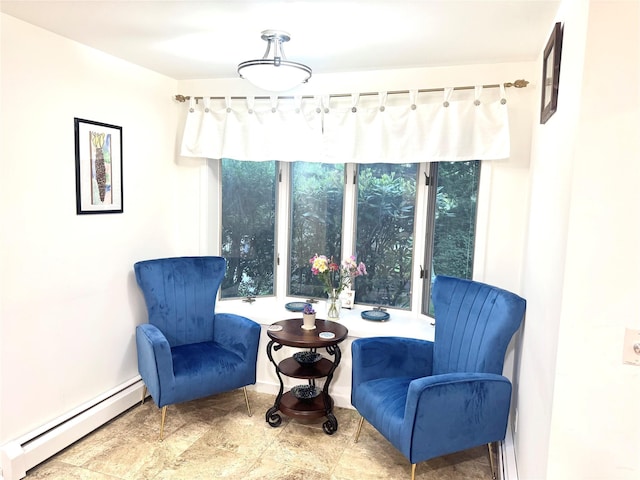 2 Greenwood Ct, Briarcliff Manor, NY 10510 - sitting room featuring a baseboard radiator and baseboards