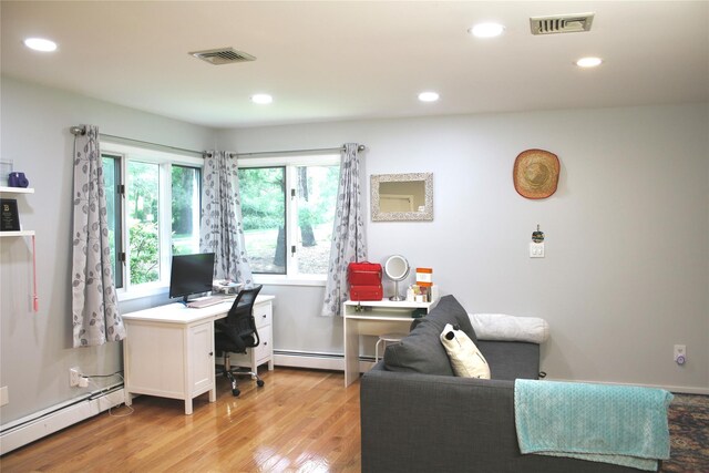 2 Greenwood Ct, Briarcliff Manor, NY 10510 - office space featuring baseboard heating, light wood-style flooring, and recessed lighting