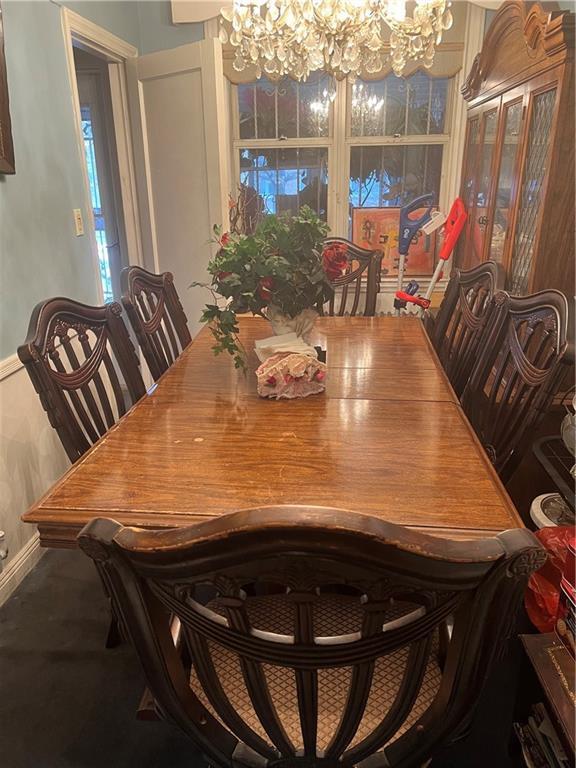 5910 Beverley Rd, Brooklyn, NY 11203 - dining space with a chandelier, baseboards, and plenty of natural light