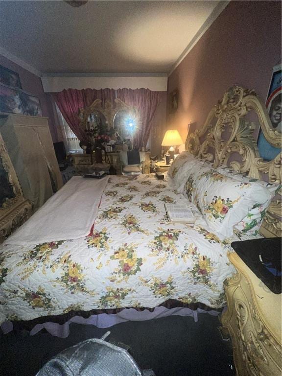 5910 Beverley Rd, Brooklyn, NY 11203 - bedroom featuring crown molding, a textured ceiling, and carpet floors
