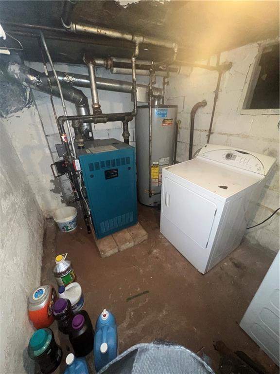 5910 Beverley Rd, Brooklyn, NY 11203 - laundry room featuring washer / clothes dryer, water heater, and a heating unit