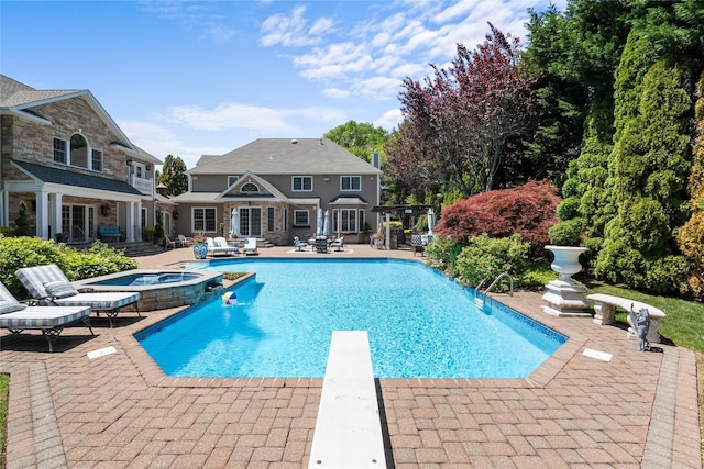 11 Crick Holly Ln, East Islip, NY 11730 - view of swimming pool with a patio area, a diving board, and a pool with connected hot tub