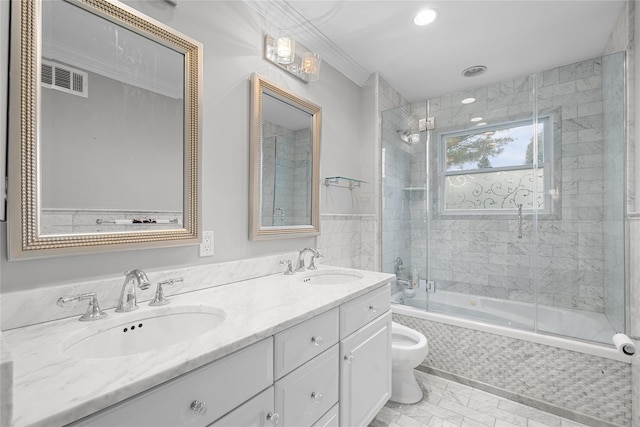 11 Crick Holly Ln, East Islip, NY 11730 - full bath with tiled shower / bath combo, toilet, double vanity, recessed lighting, and crown molding