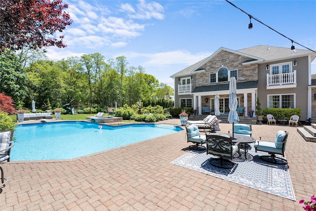 11 Crick Holly Ln, East Islip, NY 11730 - view of swimming pool featuring a patio and a pool with connected hot tub
