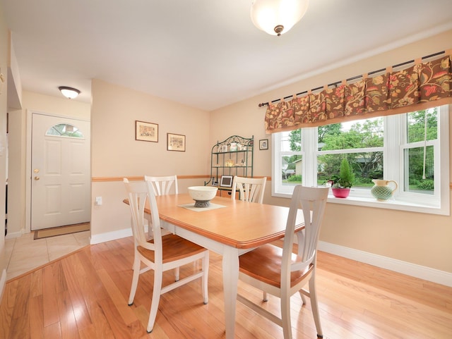 121 Bogert Ave, Pearl River, NY 10965 - dining room with light wood-style flooring and baseboards